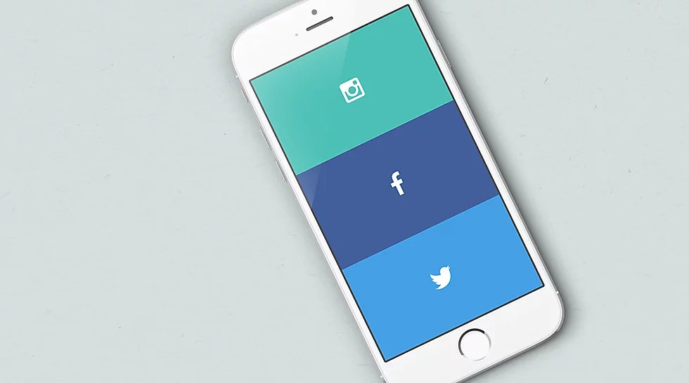 iphone displaying social media icons