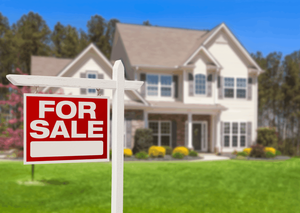 home for sale with sign